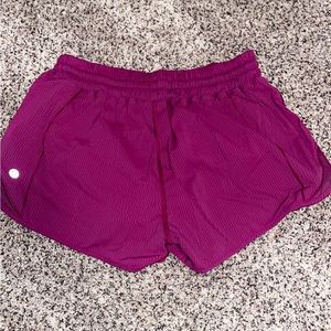 size 4 2.5 in purple lulu shorts! in good condition